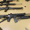 LI Man Arrested After Grenade Launchers, Military Assault Weapons Found In Closet's Secret Compartment